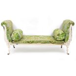 A VICTORIAN WHITE PAINTED CAST IRON DAY BED with green floral upholstery, scrolling ends, shaped