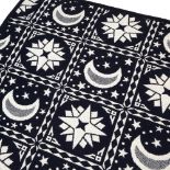A 20TH CENTURY ITALIAN WOVEN REVERSIBLE THROW OR BEDSPREAD in navy and cream colourways with a