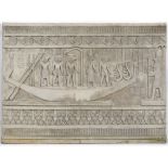 A LARGE COMPOSITE STONE EGYPTIAN STYLE WALL FRIEZE PANEL decorated with figures on a boat with