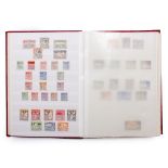 A RED STOCK BOOK and contents therein to include a collection of stamps, British Empire and