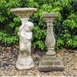 A COMPOSITE STONE SUNDIAL BASE with tapered body, standing on a square spreading base, 71cm high