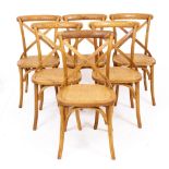 A SET OF SIX BENTWOOD CHAIRS with rattan seats, each 45cm wide x 89cm high (6)