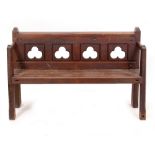 A LATE 19TH / EARLY 20TH CENTURY GOTHIC STYLE CARVED OAK BENCH 143cm wide x 57cm deep x 91cm high
