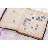 INTERNATIONAL POSTAGE STAMP ALBUM 16th edition in two parts, with various 19th century stamps,