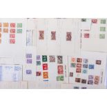 A FOLDER OF BRITISH EDWARDIAN AND LATER STAMPS including Silver Jubilee half penny stamps