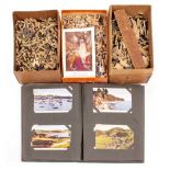 A COLLECTION OF EARLY TO MID 20TH CENTURY POSTCARDS three Vintage puzzles to include King of Kings -