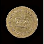 A GEORGE III THIRD GUINEA or seven shilling piece, dated 1798, weighs 3g approximately overall