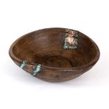 AN OLD SYCAMORE DAIRY BOWL with riveted copper repairs, 34cm wide x 10cm high