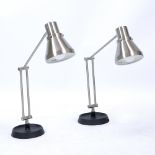 A PAIR OF ADJUSTABLE TABLE LAMPS with brushed metal finish and dish circular bases, each