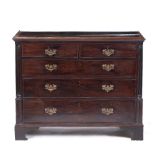 A GEORGE III NORTH COUNTRY MAHOGANY CHEST OF TWO SHORT AND THREE LONG DRAWERS with brass swan neck