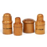 A GROUP OF TURNED SYCAMORE OR BOXWOOD BOTTLE CASES and a jar to include one inscribed to the