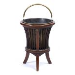 AN EDWARDIAN MAHOGANY JARDINIERE with boxwood strung decoration, waisted sides and square tapering