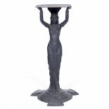 A BLACK PAINTED CAST IRON EGYPTOMANIA TABLE BASE with female figural support and a stepped base,