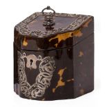 AN EDWARDIAN SERPENTINE FRONTED TORTOISE SHELL AND SILVER MOUNTED TEA CADDY with lidded inner