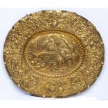 A GILT OVAL REPOUSSE PLAQUE IN THE RENAISSANCE MANNER with central classical scene, within a