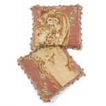 A PAIR OF PINK GROUND EARLY 19TH CENTURY AUBUSSON TAPESTRY FRAGMENT SET CUSHIONS each 37cm square (
