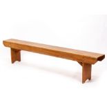 A LATE 19TH / EARLY 20TH CENTURY PINE BENCH 213cm long x 25cm deep x 45cm high