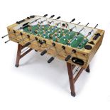 A CONTEMPORARY TABLE FOOTBALL TABLE 139.5cm long x 130cm wide x 88cm high overall