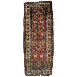 AN ANTIQUE CAUCASIAN POLYCHROME RUG with a multiple banded border and stylised foliate decoration,