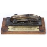 ATTRIBUTED TO FREDERICK GORDON CROSBY Captain Eyston in his record breaking MG Midget, bronze,