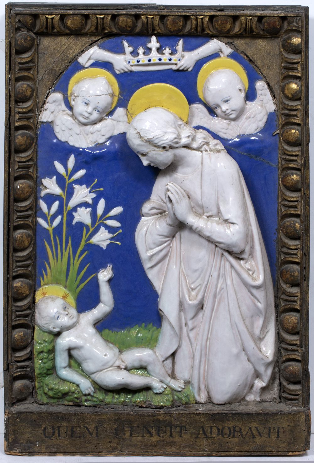 A 19TH CENTURY TIN GLAZED TERRACOTTA DELLA ROBBIA STYLE RELIEF PLAQUE depicting the adoration of The