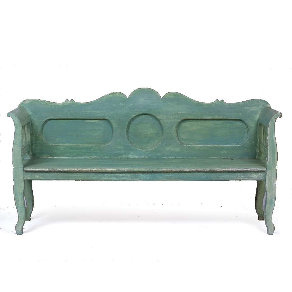 A LIGHT GREEN PAINTED PINE SETTLE with panel back, scroll arms and shaped legs, 186cm wide x 52cm