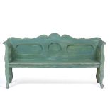 A LIGHT GREEN PAINTED PINE SETTLE with panel back, scroll arms and shaped legs, 186cm wide x 52cm