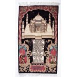 A LATE 20TH / EARLY 21ST CENTURY INDIAN PICTORIAL RUG depicting the Taj Mahal, 85cm x 145cm