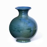 A ROYAL WORCESTER SABRINA BLUE AND GREEN GLAZE VASE of globular form and flaring rim, with faded