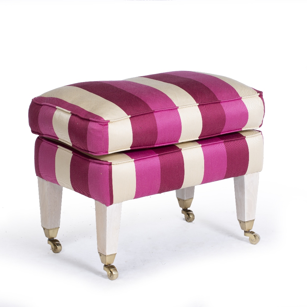 A DRESSING TABLE STOOL with feather filled swab cushion, standing on white painted square tapering