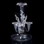 A VICTORIAN GLASS EPERGNE the central trumpets with frilled rim, leaf moulded decorations and