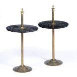 A PAIR OF BRASS AND MARBLE CIRCULAR OCCASIONAL TABLES of adjustable height on cast spreading