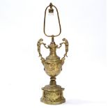 A 19TH CENTURY GILT METAL TABLE LAMP in the form of a pedestal vase on stand, with leopard