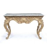 AN 18TH CENTURY FRENCH STYLE GILT MARBLE TOPPED CONSOLE TABLE with carved rococo style base and