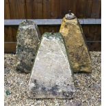 A GROUP OF THREE CARVED RECTANGULAR STADDLE STONE BASES each approximately 46cm wide x 63cm high (