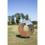 A GARDEN SCULPTURE BY DAVID HARBER stainless and oxidized steel, 160cm diameter x 25.5cm deep