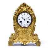 A 19TH CENTURY FRENCH ORMOLU MANTLE CLOCK the case with acanthus leaf scrolls and scallop shell