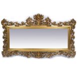 A LARGE 18TH CENTURY FRENCH STYLE GILT OVERMANTEL MIRROR the frame decorated with acanthus leaf
