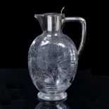 A 19TH CENTURY CLARET JUG with silver plated lid and handle, the ovoid body decoratively engraved