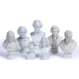 A GROUP OF SEVEN WHITE PORCELAIN PORTRAIT BUSTS depicting various writers and composers, to