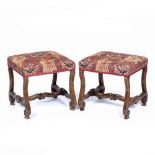 A PAIR OF 18TH CENTURY FRENCH STYLE OAK STOOLS with overstuffed upholstered seats by Nina Campbell