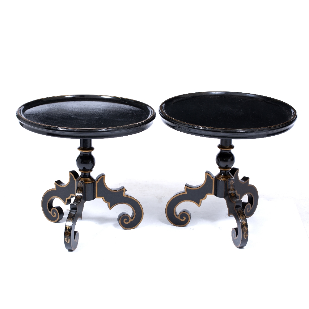 A PAIR OF BLACK LACQUERED CIRCULAR OCCASIONAL TABLES with gilded decoration, turned stems and