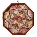 AN ANTIQUE OCTAGONAL SAILORS LOVE TOKEN in the form of a shell picture, 24.5cm wide