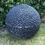A GARDEN SCULPTURE BY DAVID HARBER 'Dark Planet', complete with lighting element within, 73cm