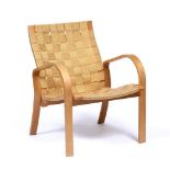 A BENTWOOD ARMCHAIR with a webbed seat, in the style of Bruno Mathsson, 61.5cm wide x 76cm deep x