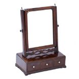 A GEORGE III MAHOGANY BOX BASE DRESSING TABLE SWING MIRROR on three drawers with ogee bracket