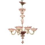 A VENETIAN PINK COLOURED GLASS FIVE BRANCH CHANDELIER with scrolling arms with flower head