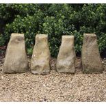 A GROUP OF FOUR CAST RECONSTITUTED STONE STANDS in the form of staddle stone bases, 58cm high (4)