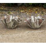 A PAIR OF TERRACOTTA FRILLED VASES OR PLANTERS 49cm wide x 23cm high