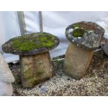 TWO OLD CARVED STADDLE STONES